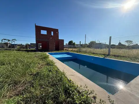 JARDINES DE LA COSTA TERRENO CON CONSTRUC. Y PILE