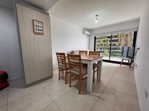 VENTA 2 AMBIENTES CON COCHERA FRENTE UNLA