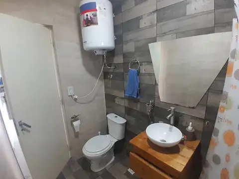 Casa 2 ambientes con 2 baños