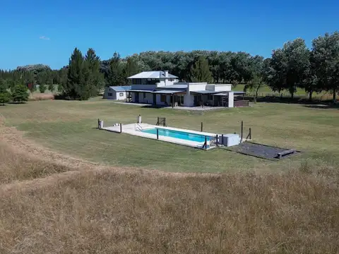 Venta de Chacra con Excelente  Casa  principal mas vivienda  de Huespedes  equipadas