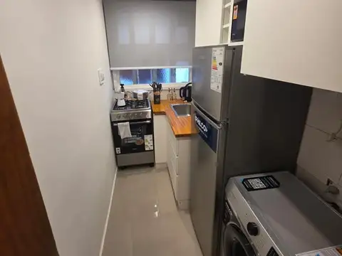 Ambiente y medio amoblado