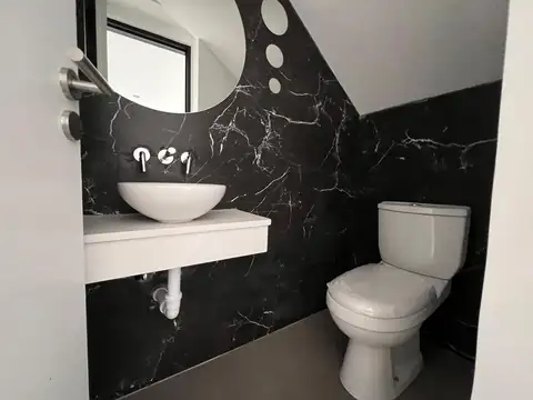 Depto Tipo Casa 4 ambientes con 3 baños