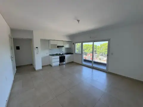 Excelente departamento de 2 ambientes cochera y Terraza propia