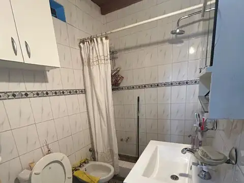 AMPLIO PH 3 AMBIENTES PLANTA BAJA FRENTE SIN EXPENSAS