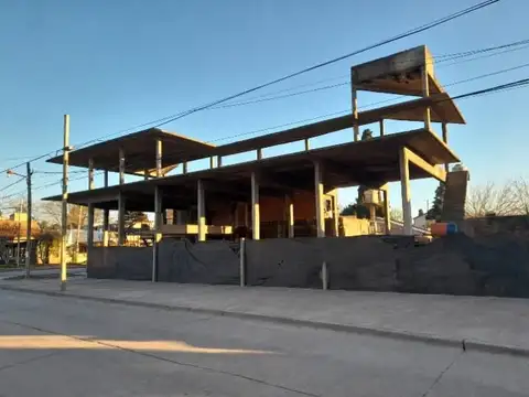 San Martin y Carlos Pellegrini 100