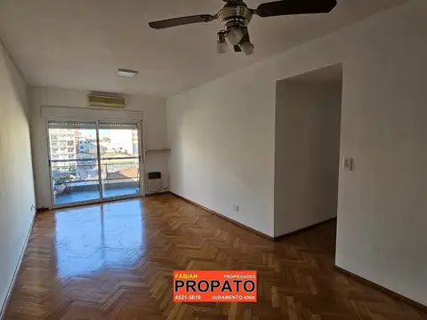 Depto de 3 ambientes en un 7 piso al frente con 2 baños, cochera fija cubierta y balcón aterrazado 
