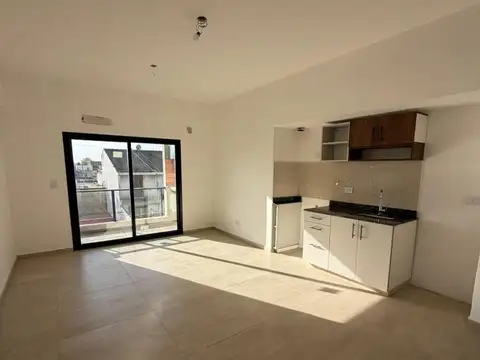 DEPARTAMENTO 2 AMBIENTES CON VESTIDOR Y COCHERA EN ALQUILER