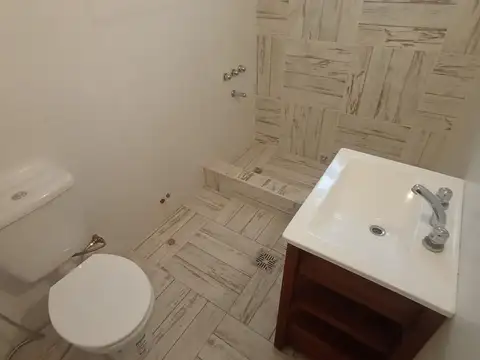 Departamento tipo PH de 2 ambientes con patio en P.B.