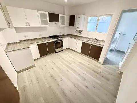 Venta departamento tres dormitorios con cochera
