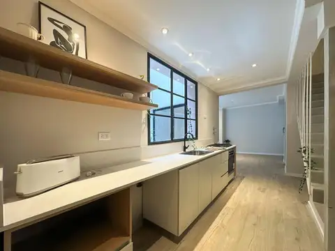 Casa de pasillo de 2 dormitorios a estrenar con patio y terraza