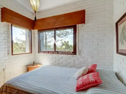 En Alquiler impecable casa con un entorno increible