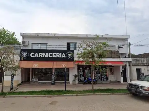 Local con departamento en zona comercial