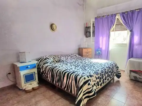 CASA CON 2/3 DORM.+FONDO+QUINCHO + LOCAL Y COCHERA