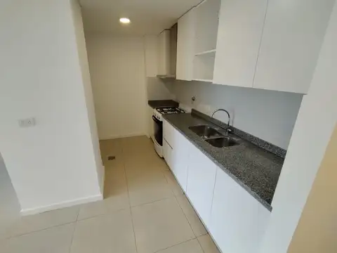 DEPARTAMENTO DOS AMBIENTES CON COCHERA Y BAULERA