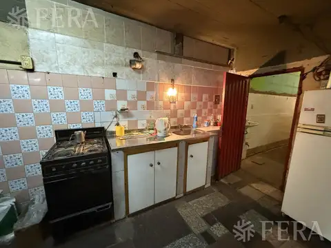 Venta casa 4 ambientes con local y patio en San Francisco Solano