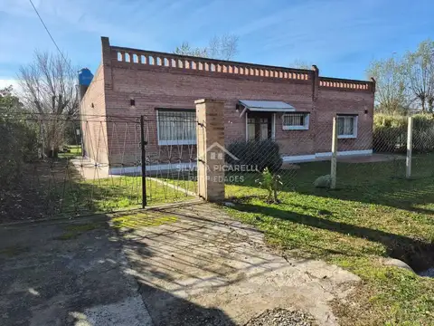 Casa 4 ambientes con 2 baños