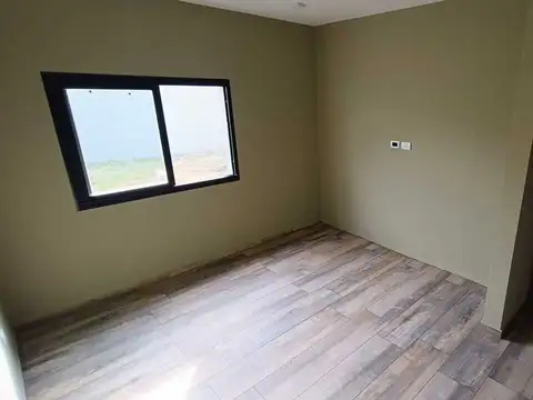 Casa de 2 Dormitorios con Losa Radiante y Terminaciones Premium.