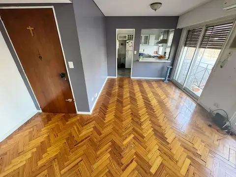 Departamento tres ambientes con cochera en alquiler