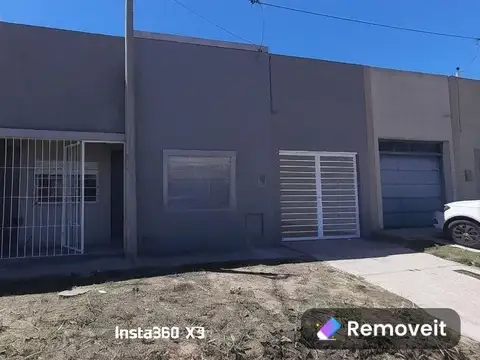 Casa y local comercial