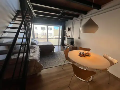 Elegante Duplex Centro. Vista parcial al algo