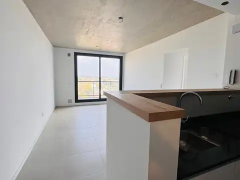 DEPARTAMENTO DOS DORMITORIOS CON BALCON Y PARRILLERO