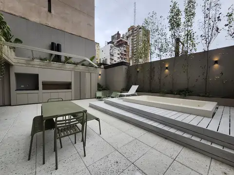 Departamento de 2 dormitorio con patio piscina y parrila premium con financiacion
