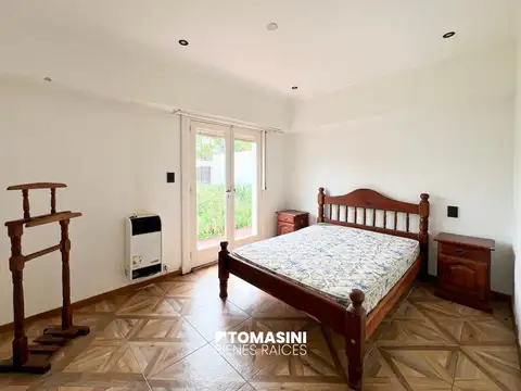 DEPARTAMENTO DE 3 AMBIENTES CON GARAGE, PARQUE Y PARRILLA