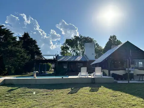 VENTA DE CASA CON BAJADA AL LAGO POTRERO DE GARAY