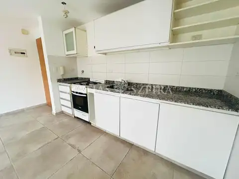 VENTA DEPARTAMENTO 2 AMBIENTES COCHERA Y BALCON  MERLO CENTRO