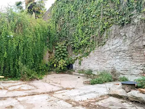 Venta de terreno con construcción en Pando
