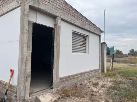VENTA TERRENO CON CASA EN CONSTRUCCION RIVADAVIA