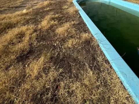 Terreno con pileta y platea terminada