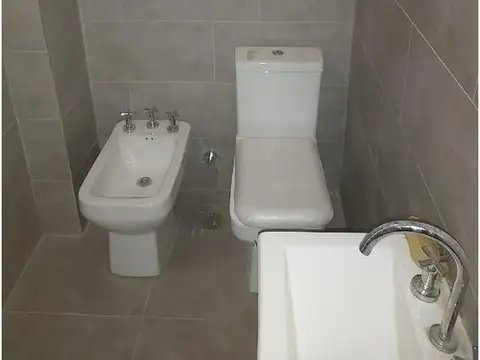 Tres ambientes con cochera