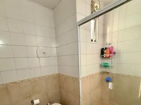 CASA DE PASILLO TIPO DUPLEX - DOS DORMITORIOS