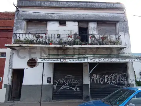 Venta en bloque de local comercial y departamento