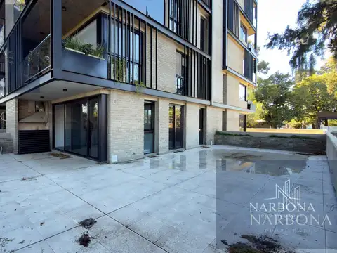 VENTA DEPARTAMENTO 1 DORMITORIO Y COMODÍN, CON PATIO, PARRILLERO Y COCHERA. CONDOS PADDOCK- TORRE I