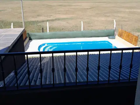 Casa 4 ambientes con 2 baños