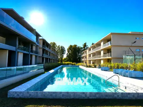 Venta Depto 1 amb. PB c/jardín, parrilla y cochera