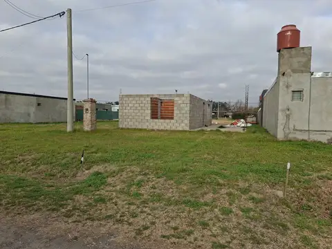 Terreno con construcción a terminar