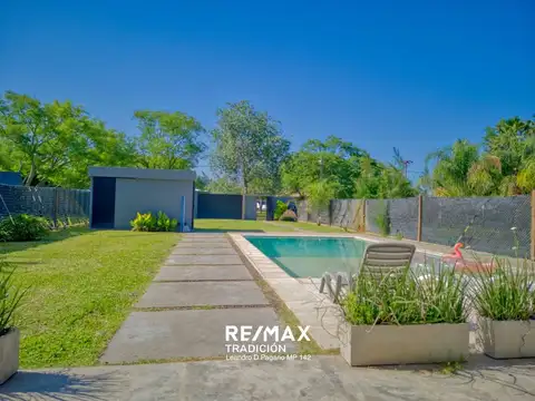 CASA EN VENTA 3 AMB. B° CHACRAS DE BENITEZ-PISCINA