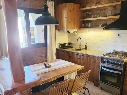 Departamento tipo cabaña en Carilo en complejo con amenities.