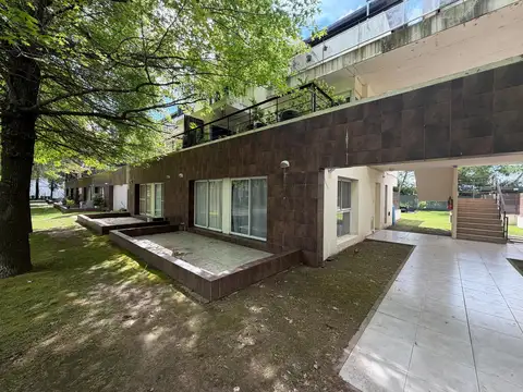 Departamento de 2 dormitorios con cochera en Condominio de Barrio Cerrado