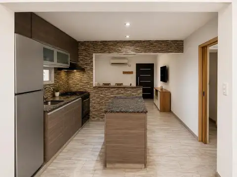 VENTA - Casa de dos dormitorios y patio con terraza en Rosario. Apto crédito
