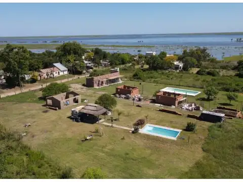 Amplio terreno de 4.500 m2 con pileta, quincho y construcción empezada. Luz y agua. Quinto Cuar...