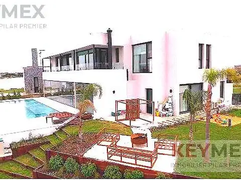 CASA VENTA MUELLES PUERTOS 4 DORMITORIOS  PILETA GALERIA  A LAGUNA CENTRAL PARRILLA