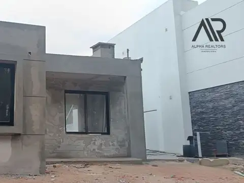 Casa en venta c/ cochera en Burnett