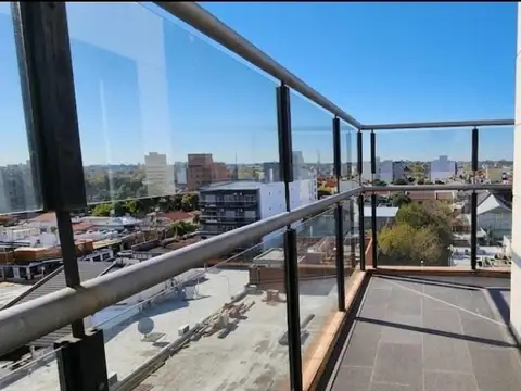 Departamento de 4 ambientes con balcon y dos garaje cubierto