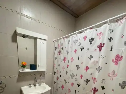 Venta casa de 2 dormitorios con pileta y jardín Los Carrizales, Clarke, Santa Fe