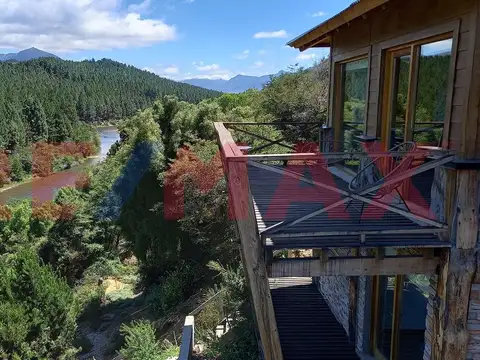 RE/MAX vende complejo cabañas frente río Meliquina