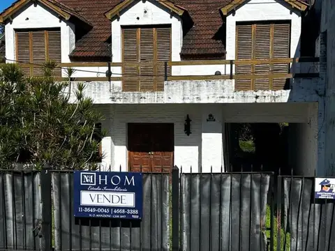 CASA EN MUÑIZ